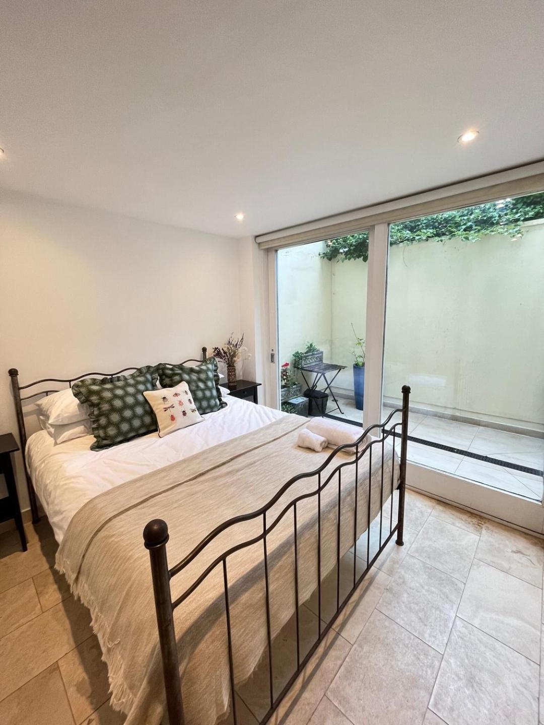 Holland Park Hideaway: A Stylish Escape Сasa de vacaciones *