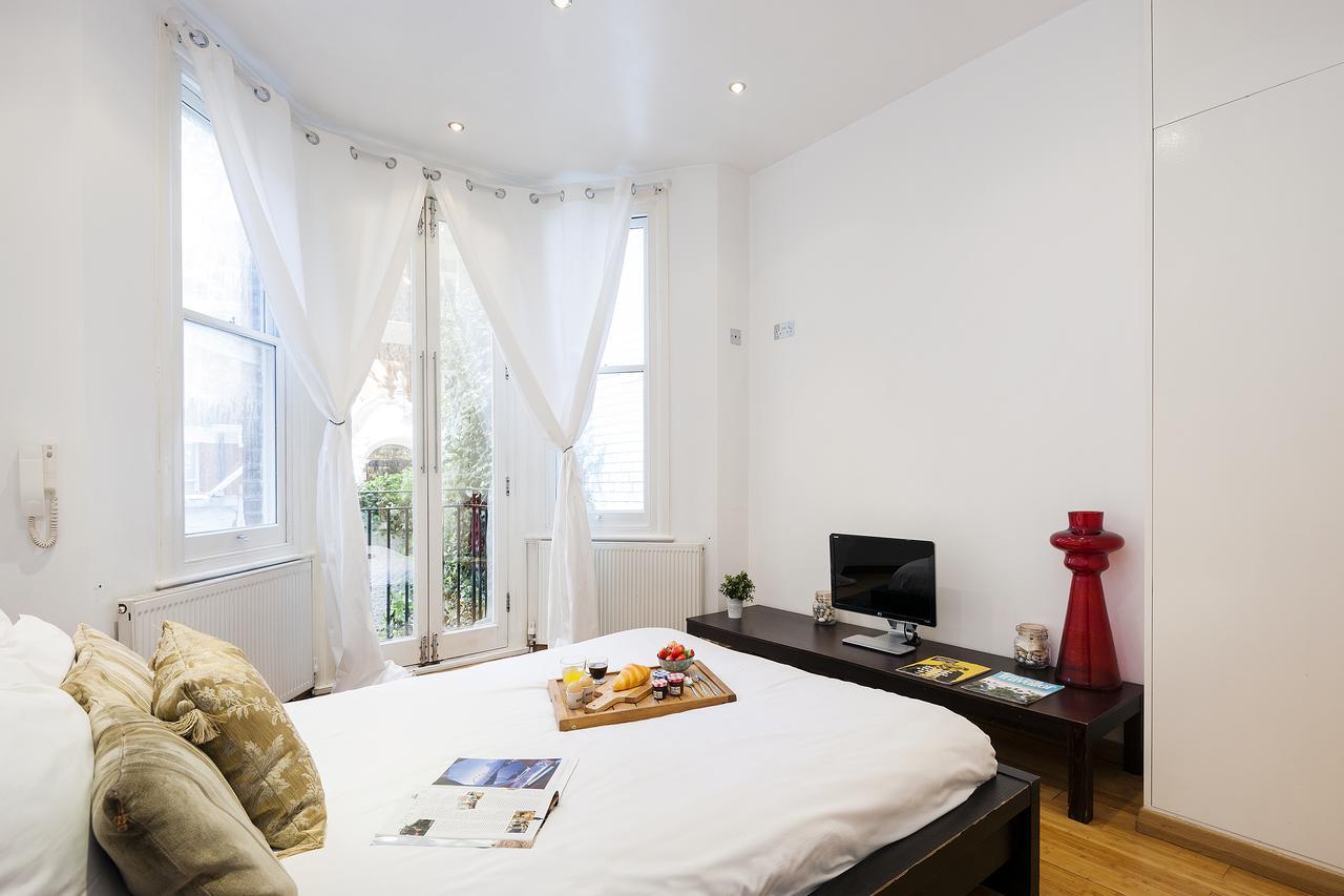 Appartement The Cheniston Gardens Abode Londen