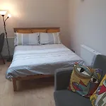 Large Bright Room With Kitchen