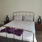 Elegant King Bed Get Away
