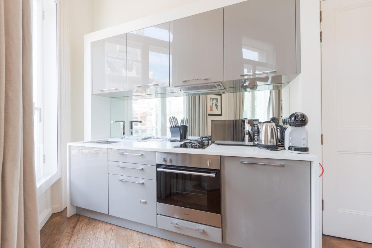 Grosvenor Gardens By Capital Apartment *