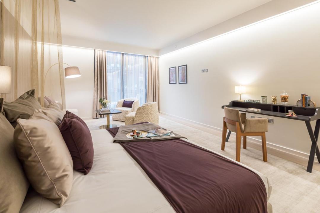Apartahotel The Quarters Swiss