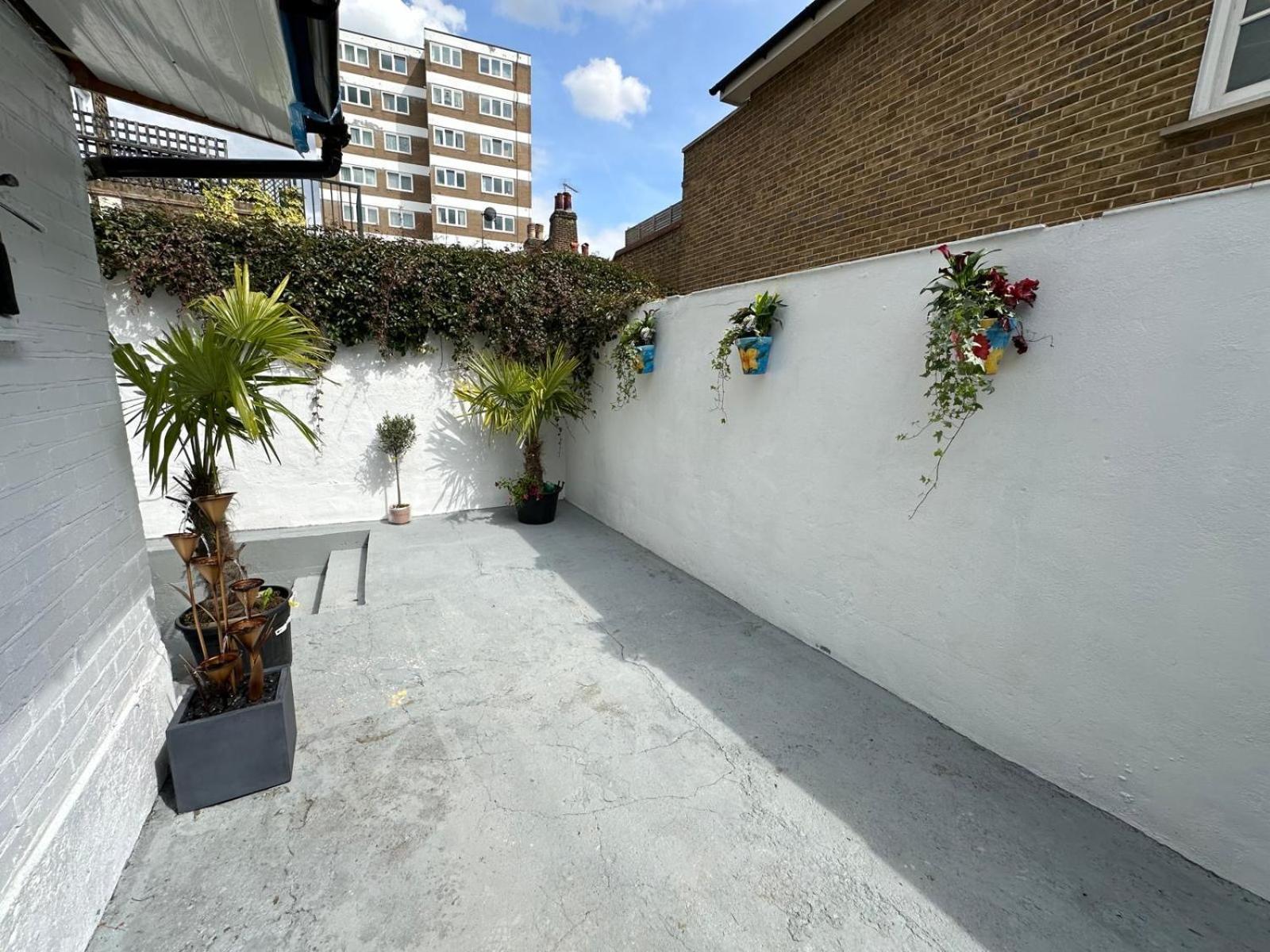 Stylish Garden-level Flat In Chiswick Apartamento