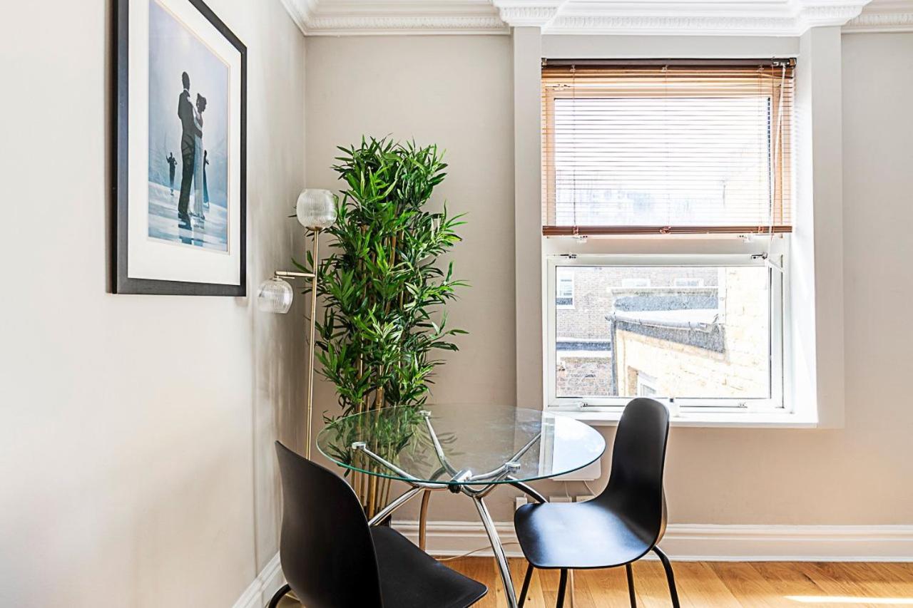Appartement Modern Top-floor Victorian Charm In Kensington Londen