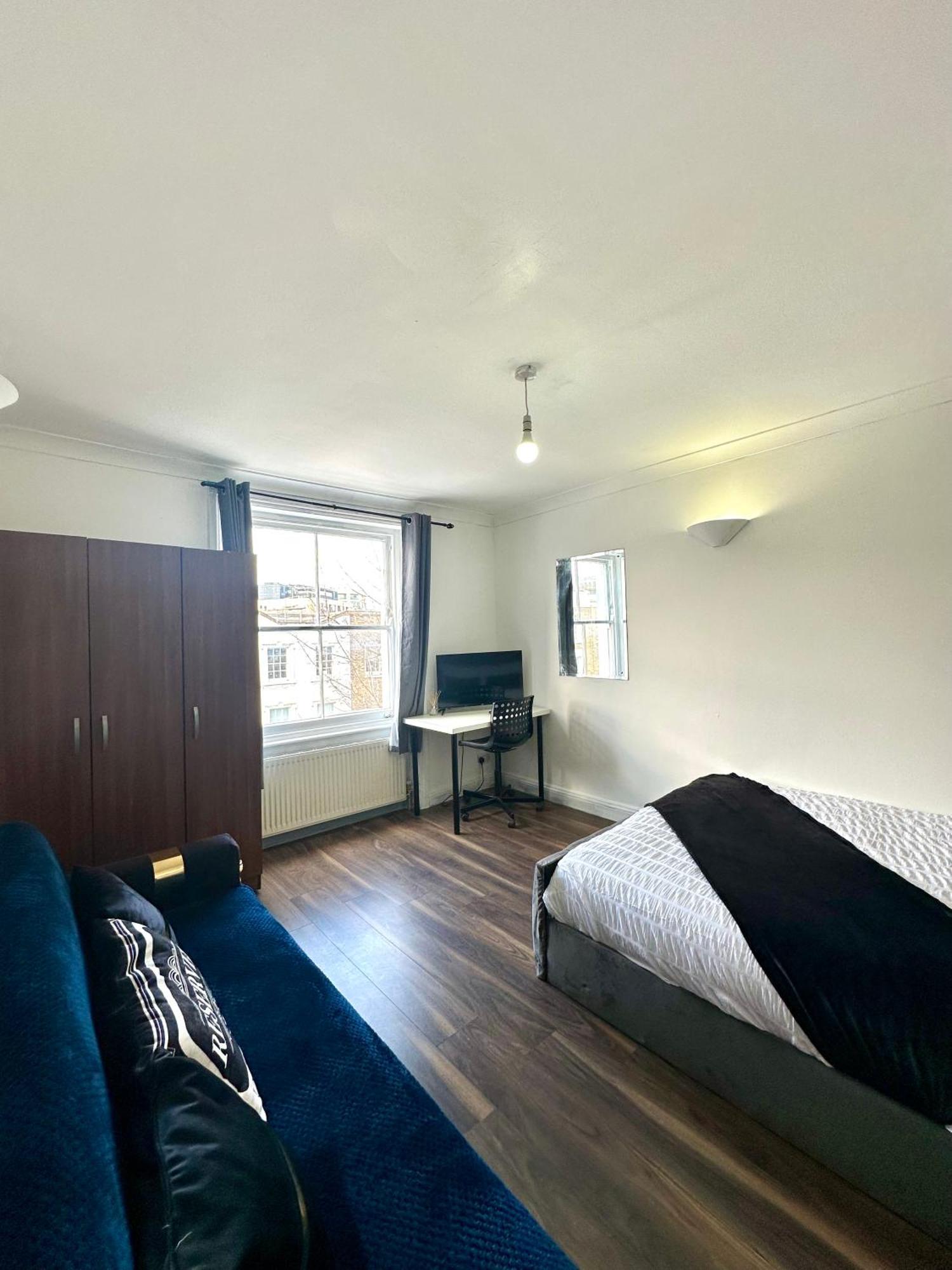 Spacious 4- Bedroom Flat! Kings Cross, St Pancras Apartment *