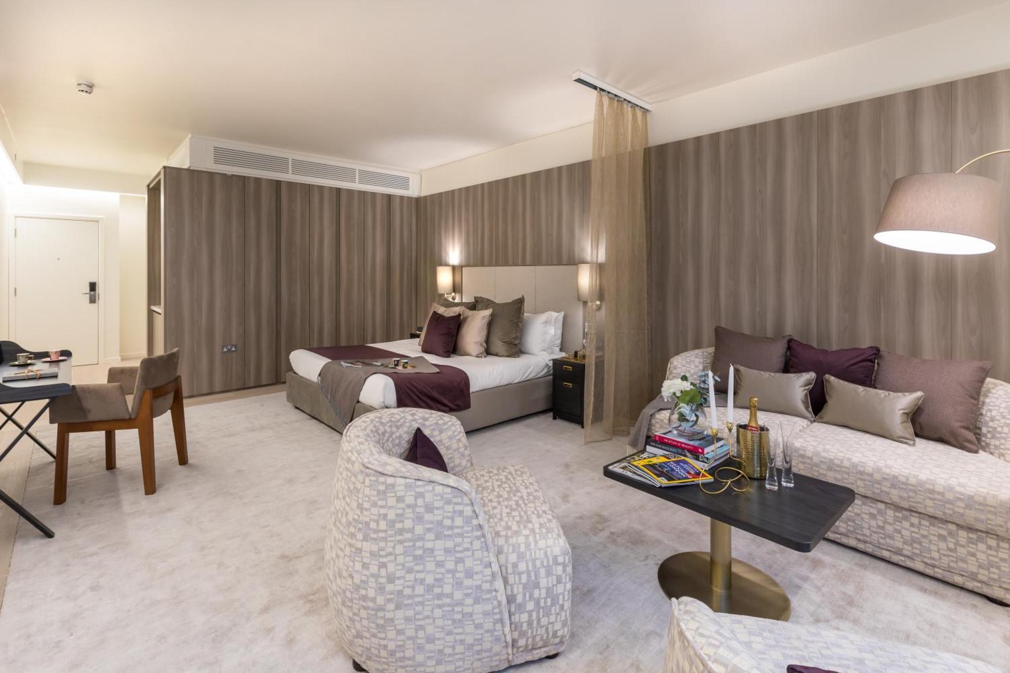 Apartahotel The Quarters Swiss