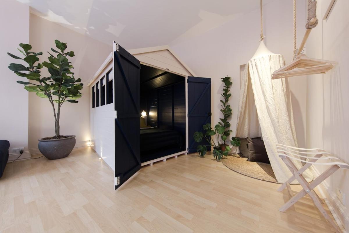 Apartment Loft W 100inch Cinema, Premium Mattress & Hammock, By The Design Traveller