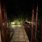 A Beautiful Room With A Private Garden