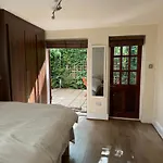 A Beautiful Room With A Private Garden