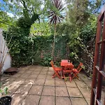 A Beautiful Room With A Private Garden
