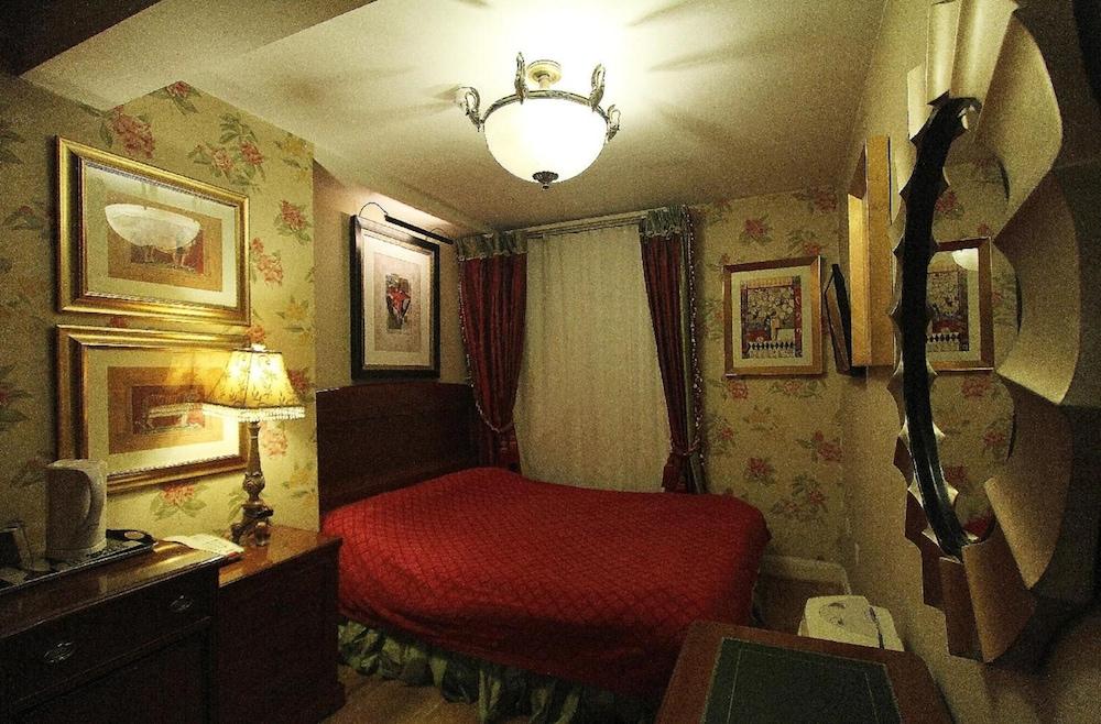 Opulence Boutique Hotell
